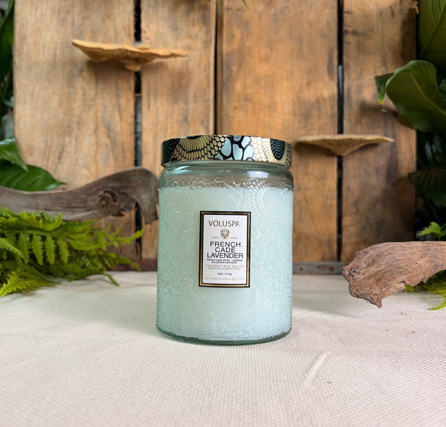 Voluspa French Cade Lavender Glass Jar Candle 18 oz - Voluspa French Cade Lavender Glass Jar Candle 18 oz  Fragrance Notes: The rustic, woodsy and herbaceous nature of sun-drenched Provence is harvested with an aromatic infusion of lush lavender, rare French cade wood and vivid lemon verbena.