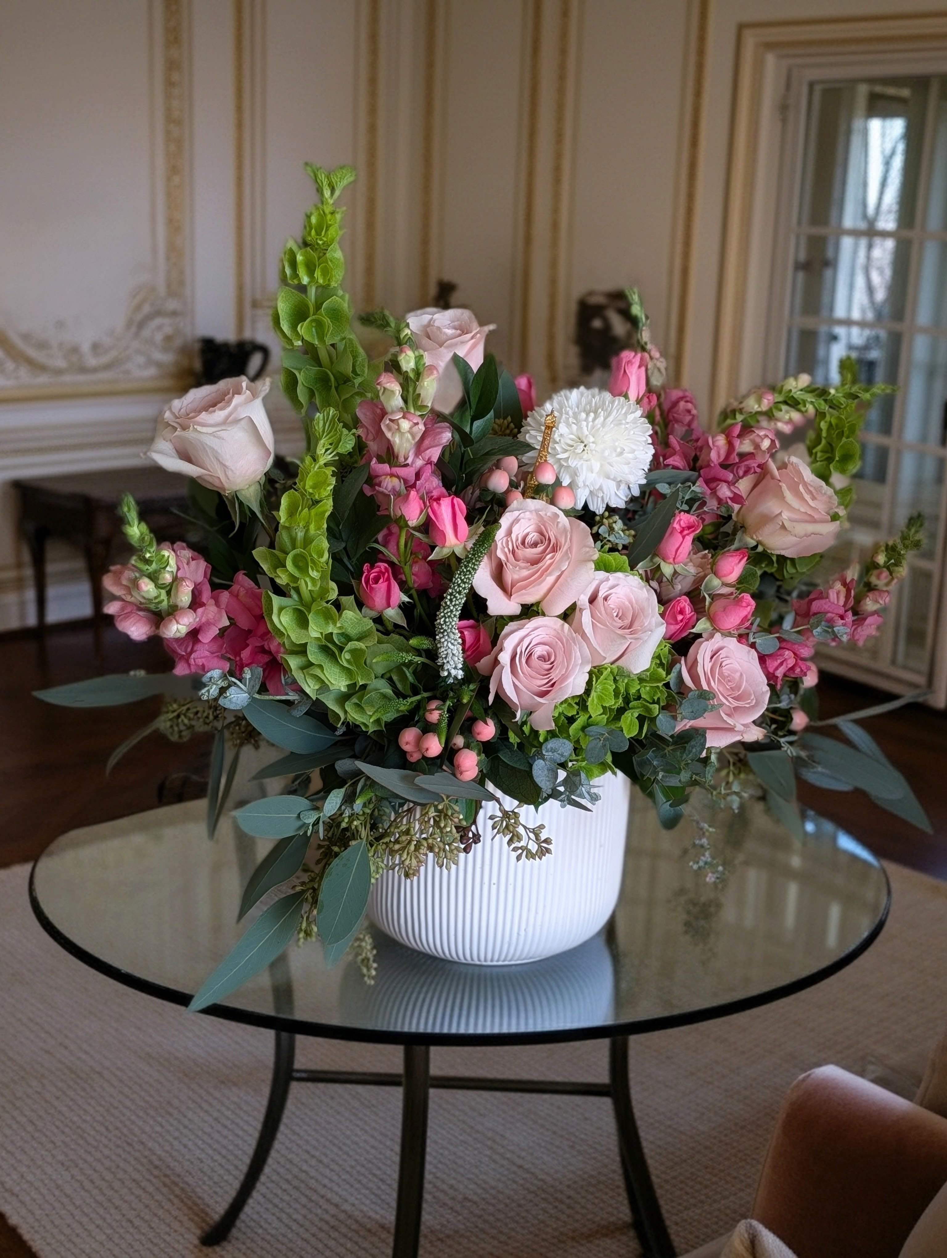 Parisian Delight – Blush Pink Roses &amp; Snapdragons - A garden style of soft blush, cream of seasonal flowers design in a white ceramic container.
