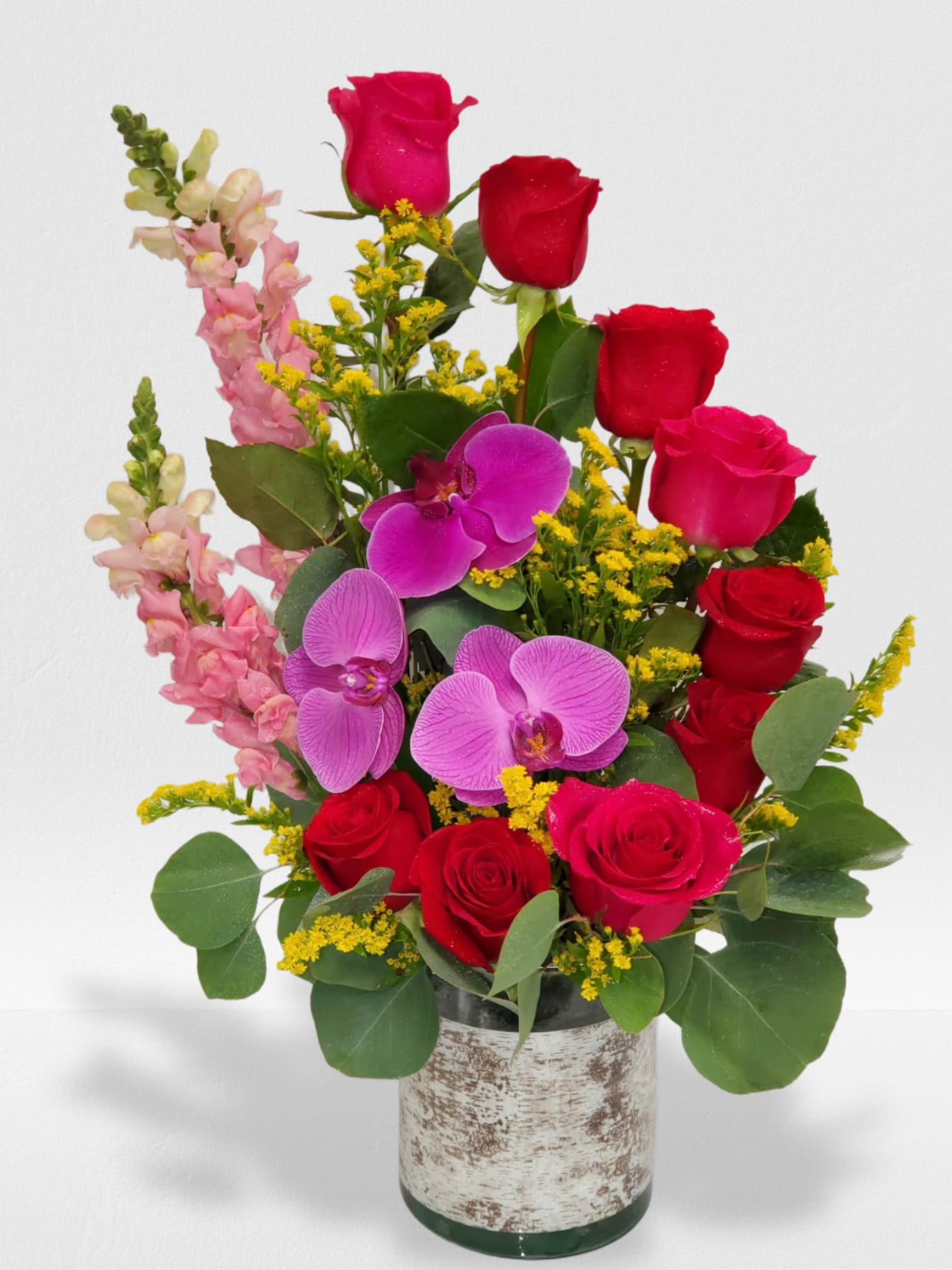 Love at First Sight - Hot pink and red roses, pink snaps and orchids arrange in a beautiful way 