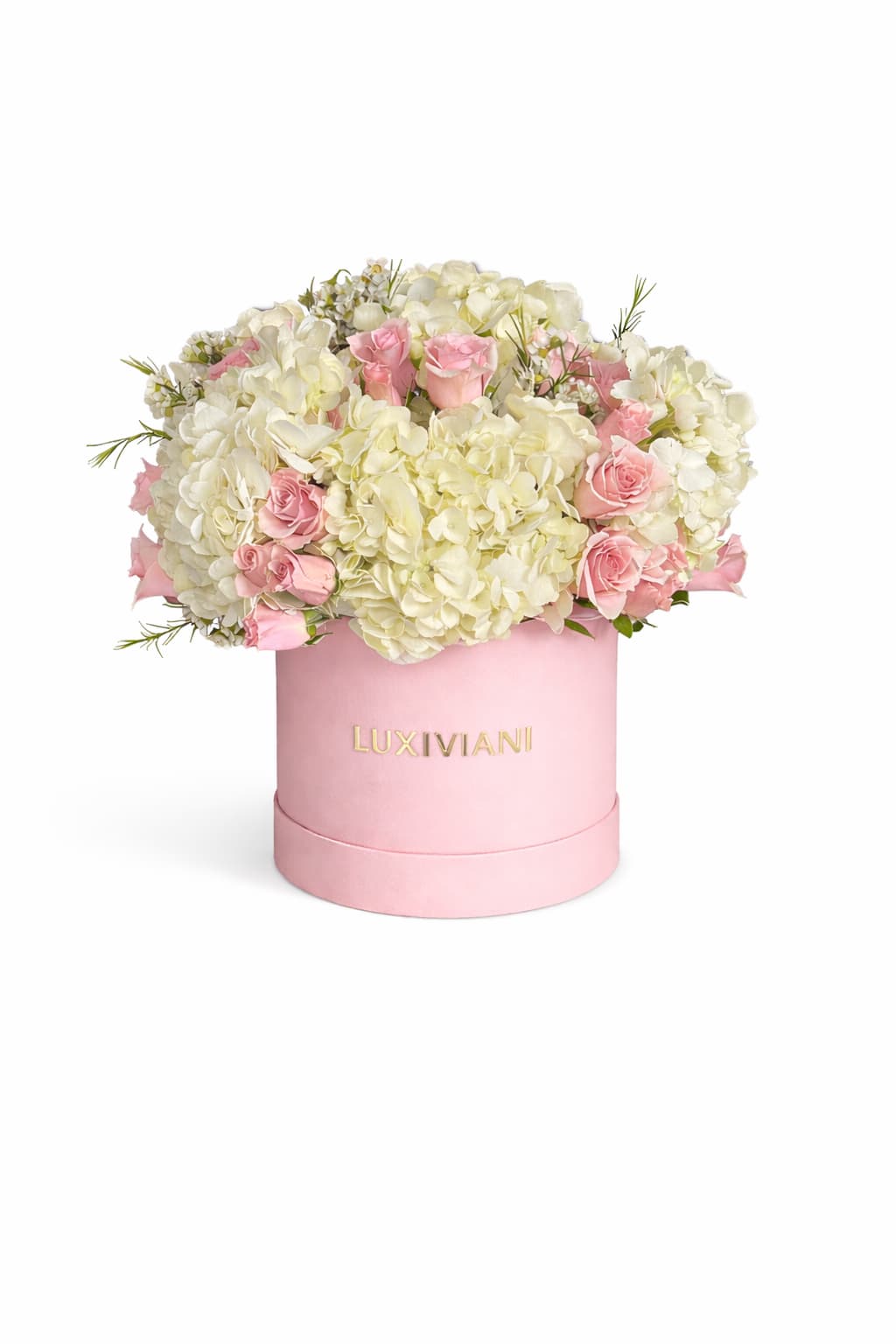 Pink roses and white hydrangeas in a pink round box
