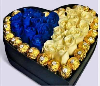 Royal Heart for Dad - Exclusive heart-shaped box combining elegant royal blue and premium white roses, framed by gourmet Ferrero Rocher chocolates. The perfect, sophisticated gift to celebrate the king of the home on Father's Day.