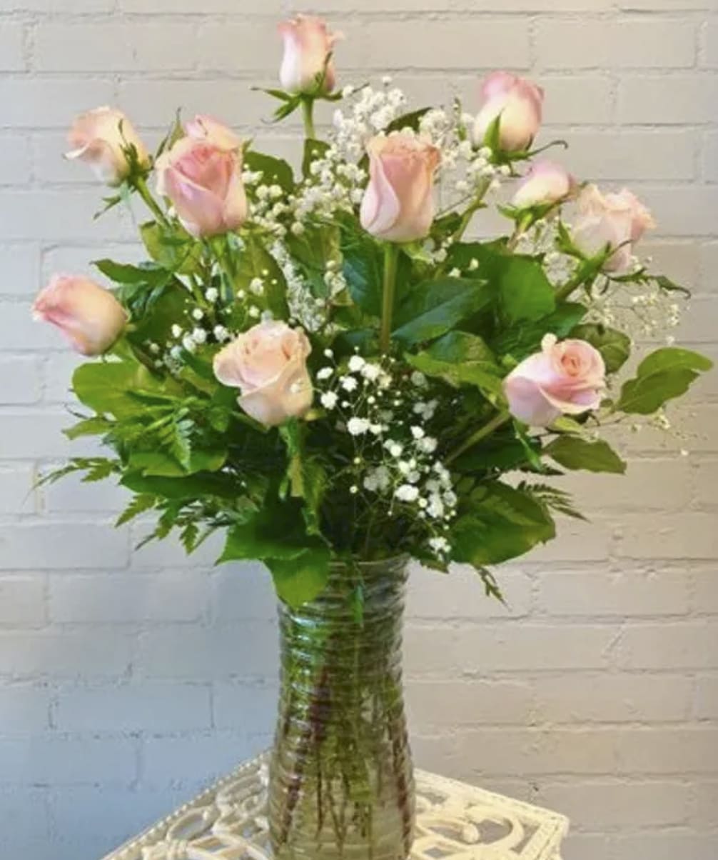Pink Rose Dozen - Beautiful roses in pink, designed in a clear glass vase complete with greens.