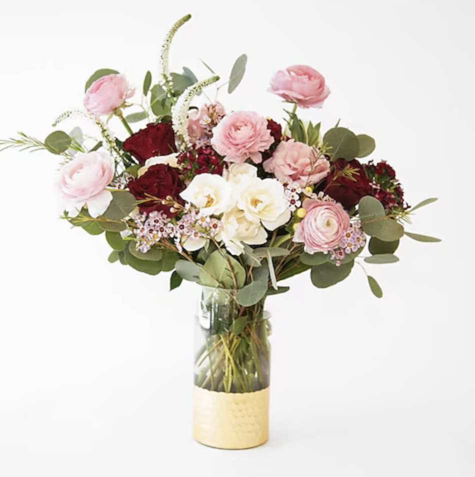  Luxe and Romantic - NICE MIX OF PINK WHITE AND RED BLOOMS IN A HONEYCOMB VASE