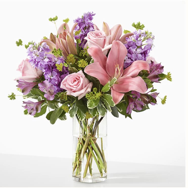 PRETTY AND PINKS - LILIES, STOCK, ALSTROEMERIA, BLUPLURUM AND MORE MAKE THIS PURPLE AND PINK PERFECT FOR MANY OCCATIONS.
