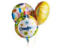 Three colorful balloons with a birthday message
