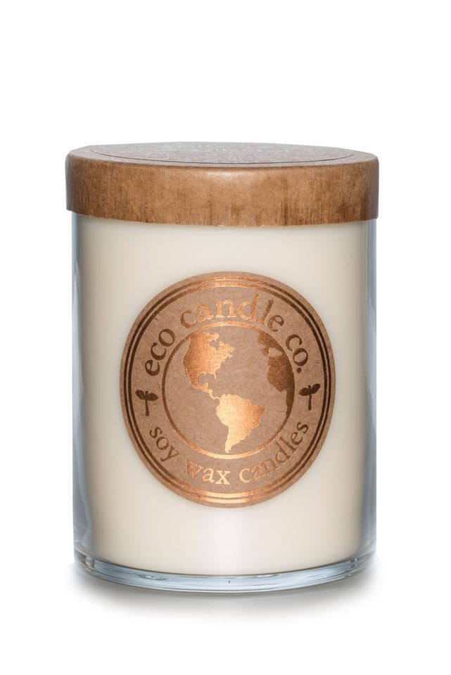 Soy wax candle in a glass jar with a wooden lid
