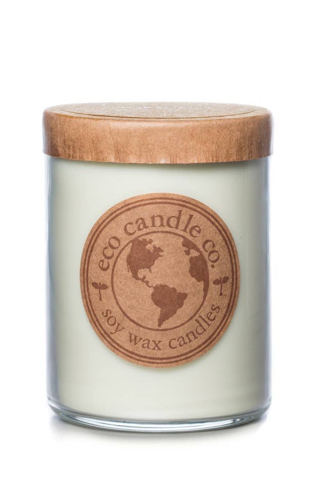 Soy wax candle in a glass jar with a wooden lid