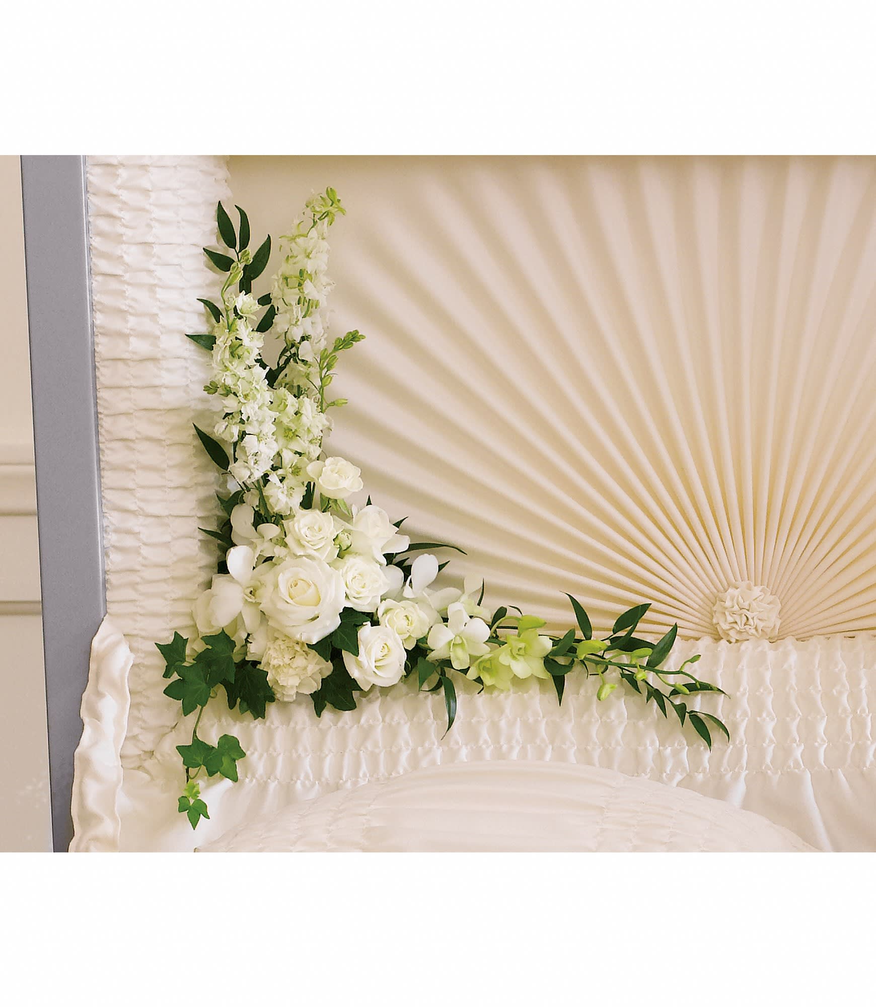 Moonlit Walk by Teleflora - This serenely beautiful arrangement of white orchids, white roses and other popular white flowers is a fitting and very personal tribute when placed inside the casket.  