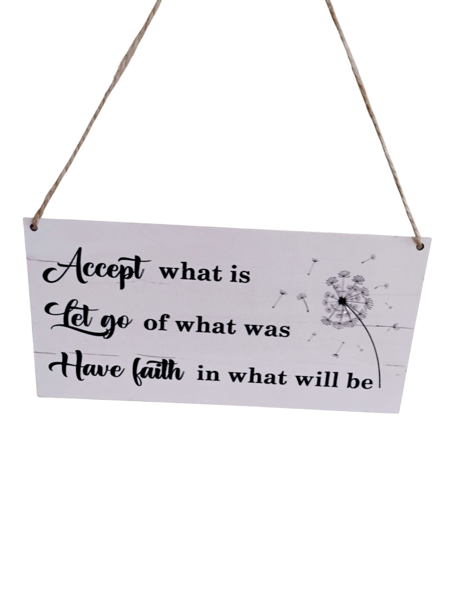 Hanging sign with a motivational quote and dandelion graphic
