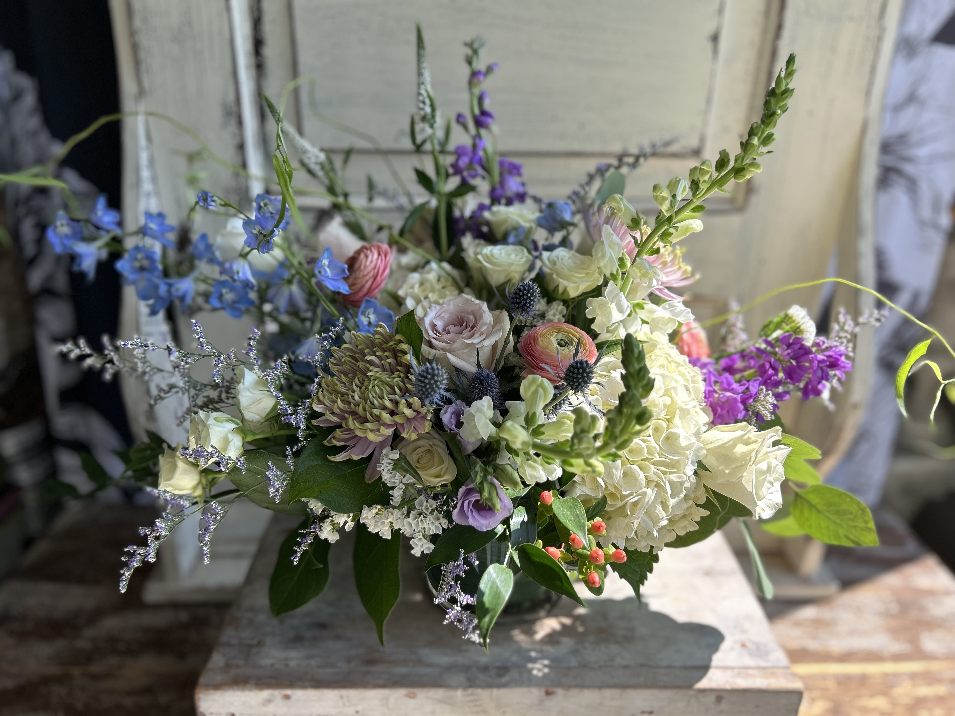 Mixed bouquet with blue, white, pink, and purple flowers