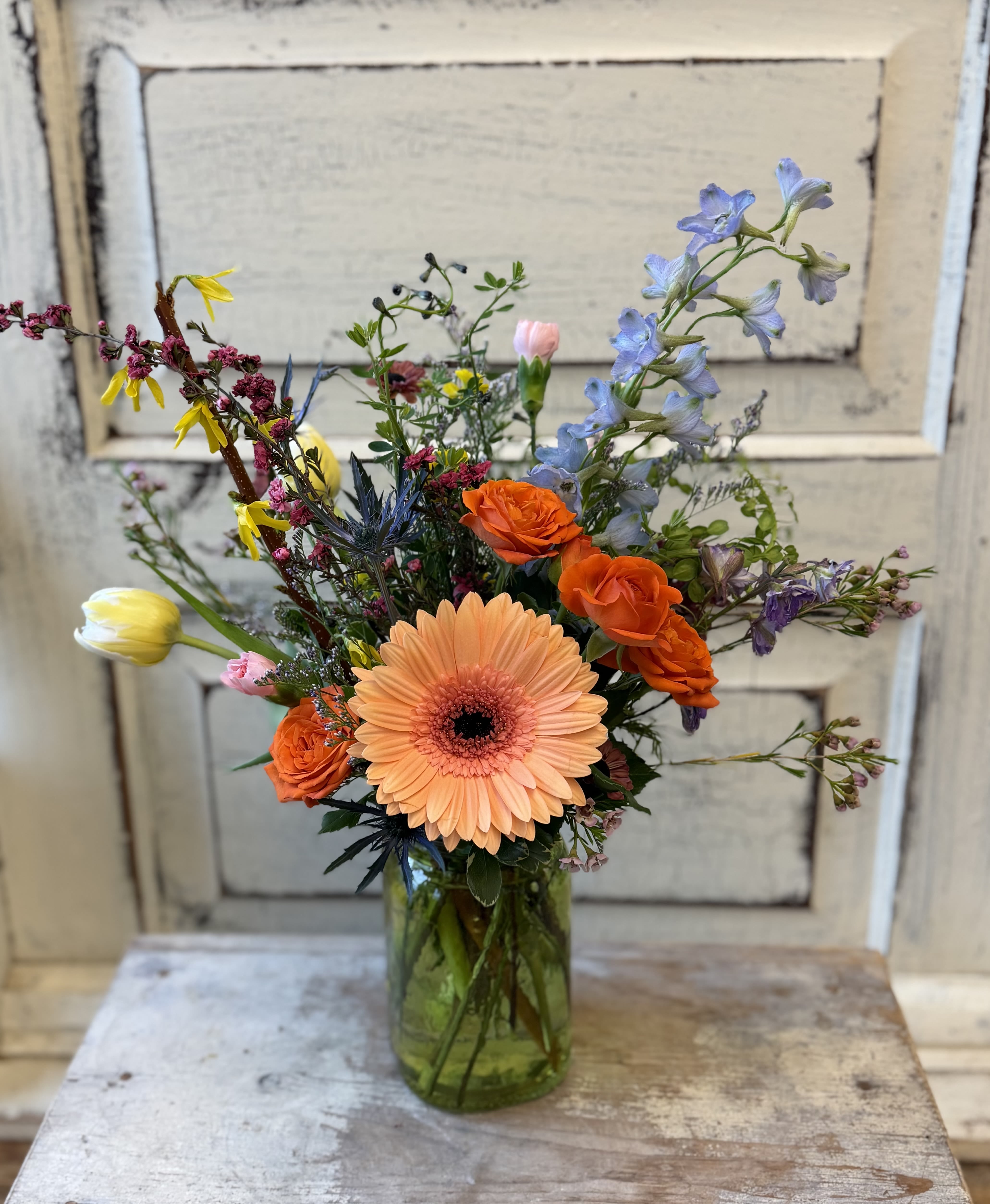 Meadow Bouquet - A small colored glass vase or jar holds a just right petite assortment of fresh flowers and foliage perfect for a small gift. Flower varieties and colors will vary from the photo. Glass will come in pink, green, purple or blue.
