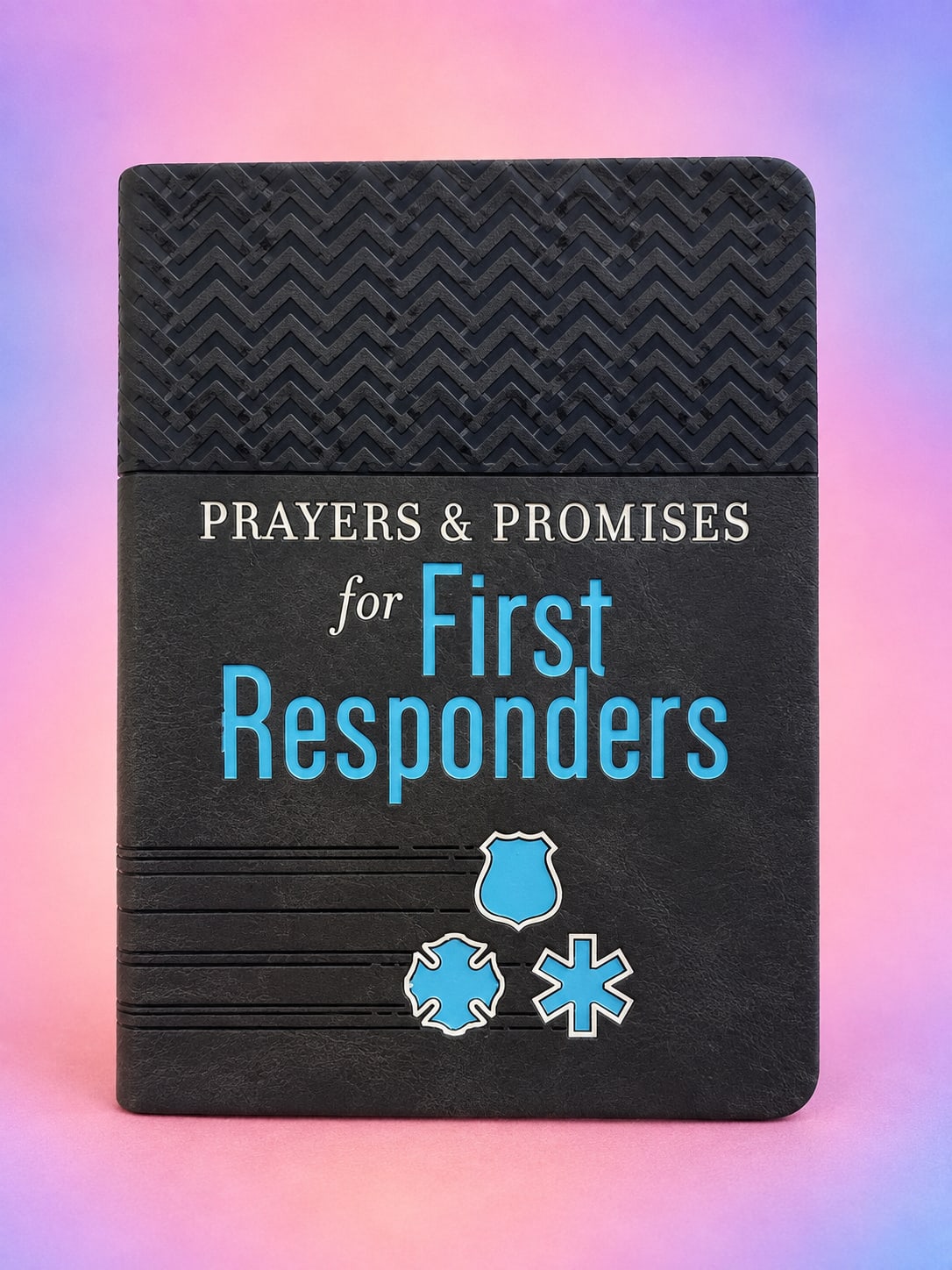 Black book titled "Prayers &amp; Promises for First Responders" on a pink background.