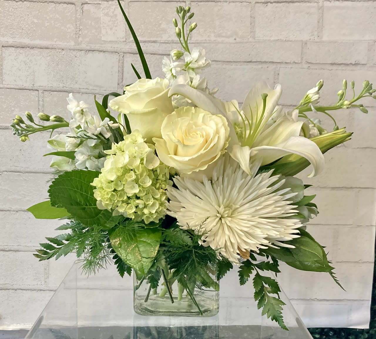 Isles of White  - This lovely bouquet delivers an oasis of beauty and elegance. Soothing, serene and very special.