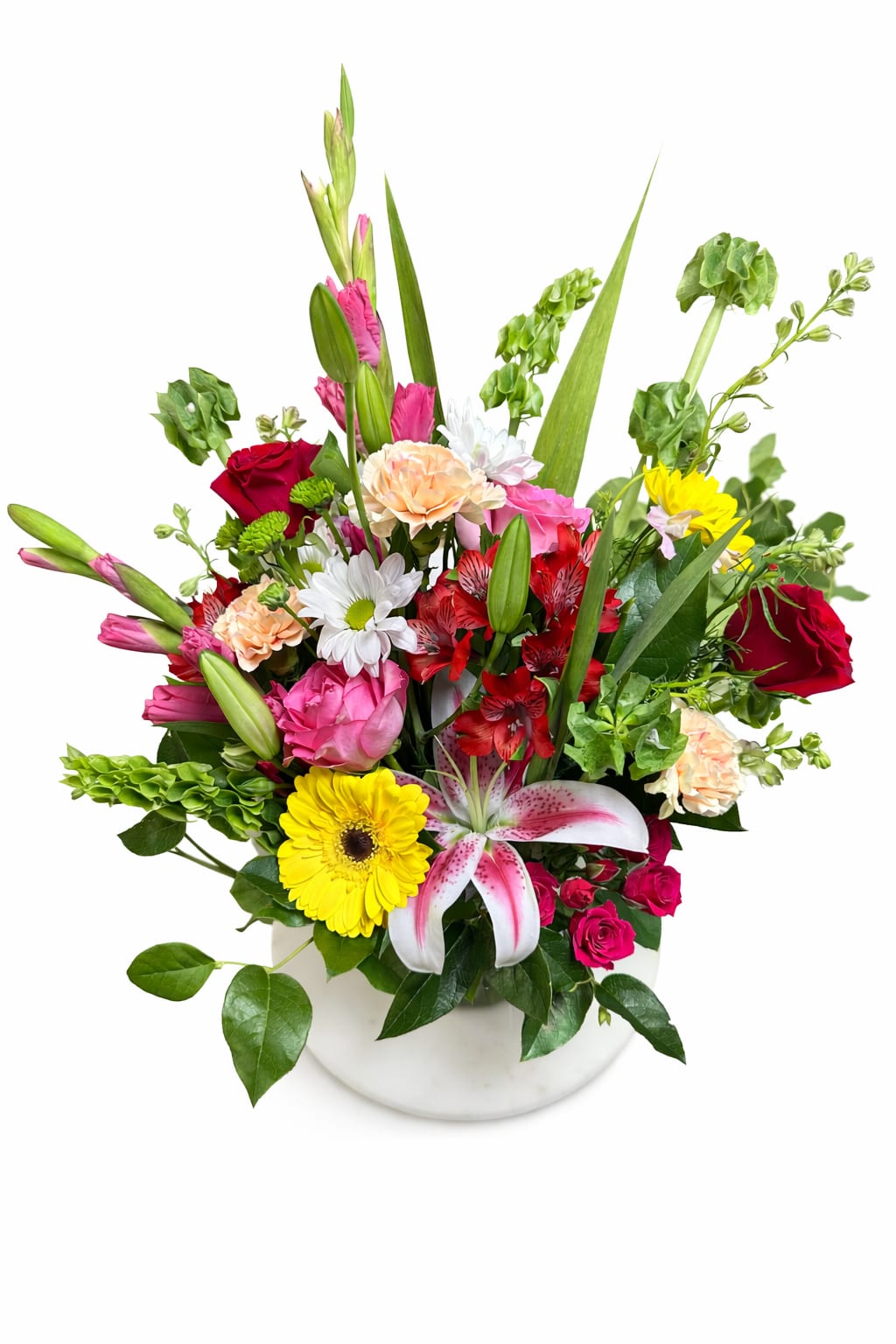 Mixed bouquet in a white vase with roses, lilies, and daisies