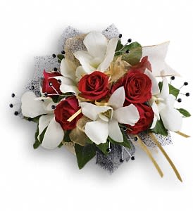 Star Studded Corsage - Steal the spotlight in wondrous white orchids and classic red roses.  White dendrobium orchids, red spray roses and green ivy.  Approximately 6" W x 5" H