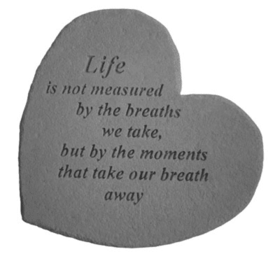 Heart-shaped memorial plaque with a printed quote