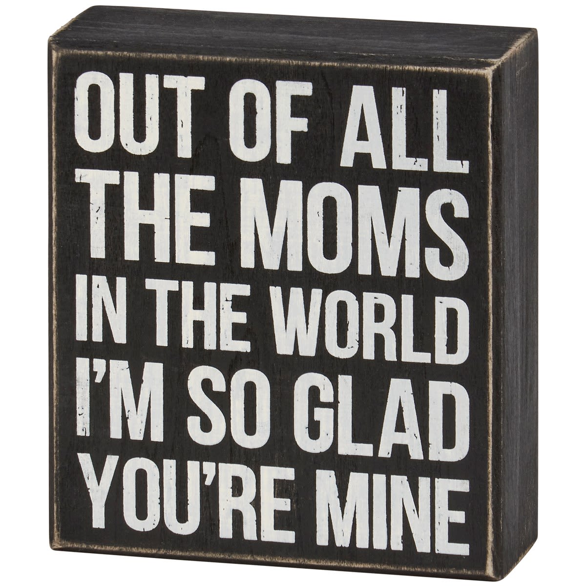 Box Sign All The Moms - A classic black and white wooden box sign for Mother's Day displaying a fun mom-themed sentiment that reads "Out Of All The Moms In The World I'm So Glad You're Mine." Mom box sign features distressed details with coordinating black color on sides and back. Our All The Moms box sign is easy to hang or can free-stand alone. A fun Mother's Day gift that can be easily displayed in any home or work space.
