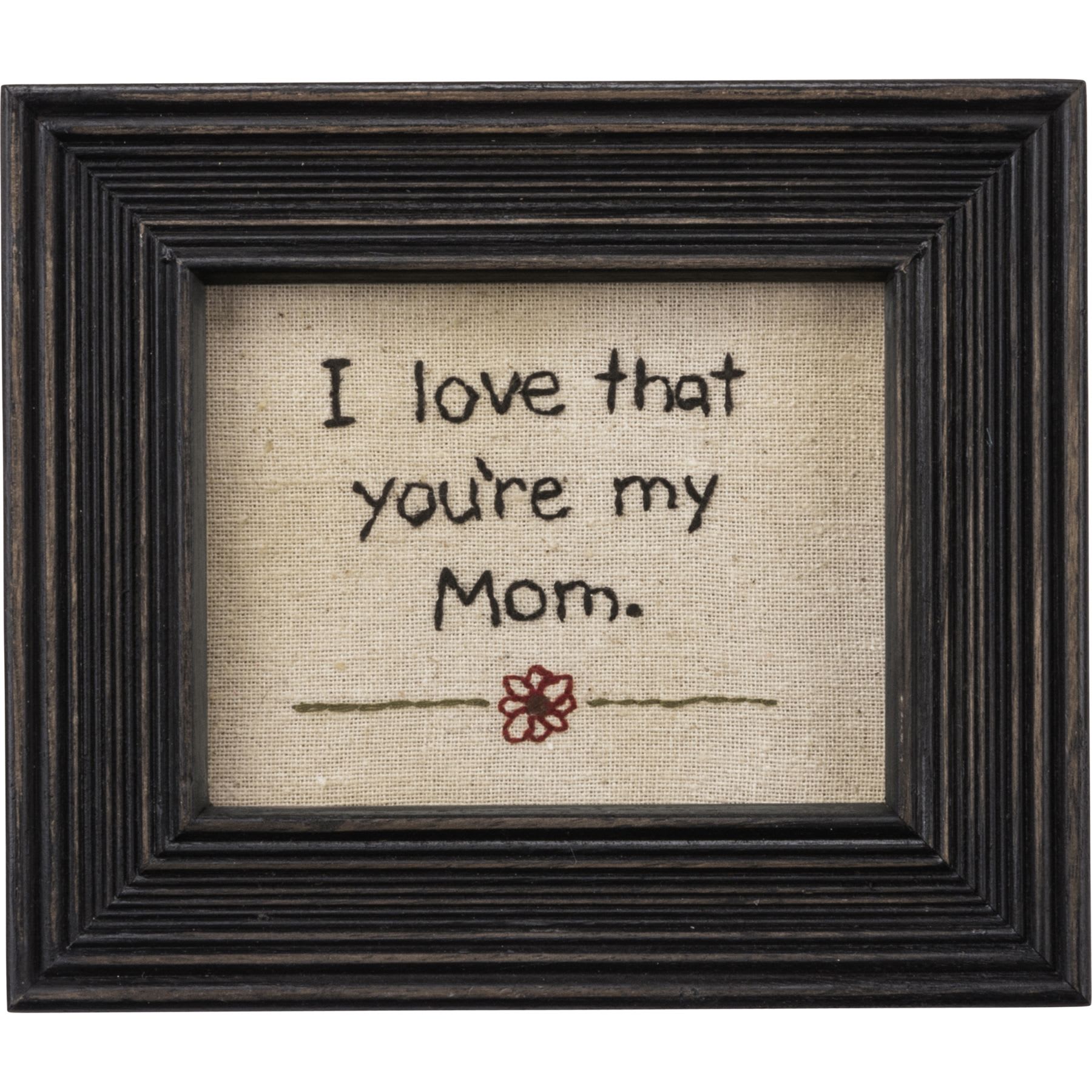 Frame I Love That You're My Mom - A timeless piece of framed stitchery featuring an embroidered "I Love That You're My Mom" sentiment with flower design on a pulled canvas. Complements well with existing decor or coordinating design pieces.