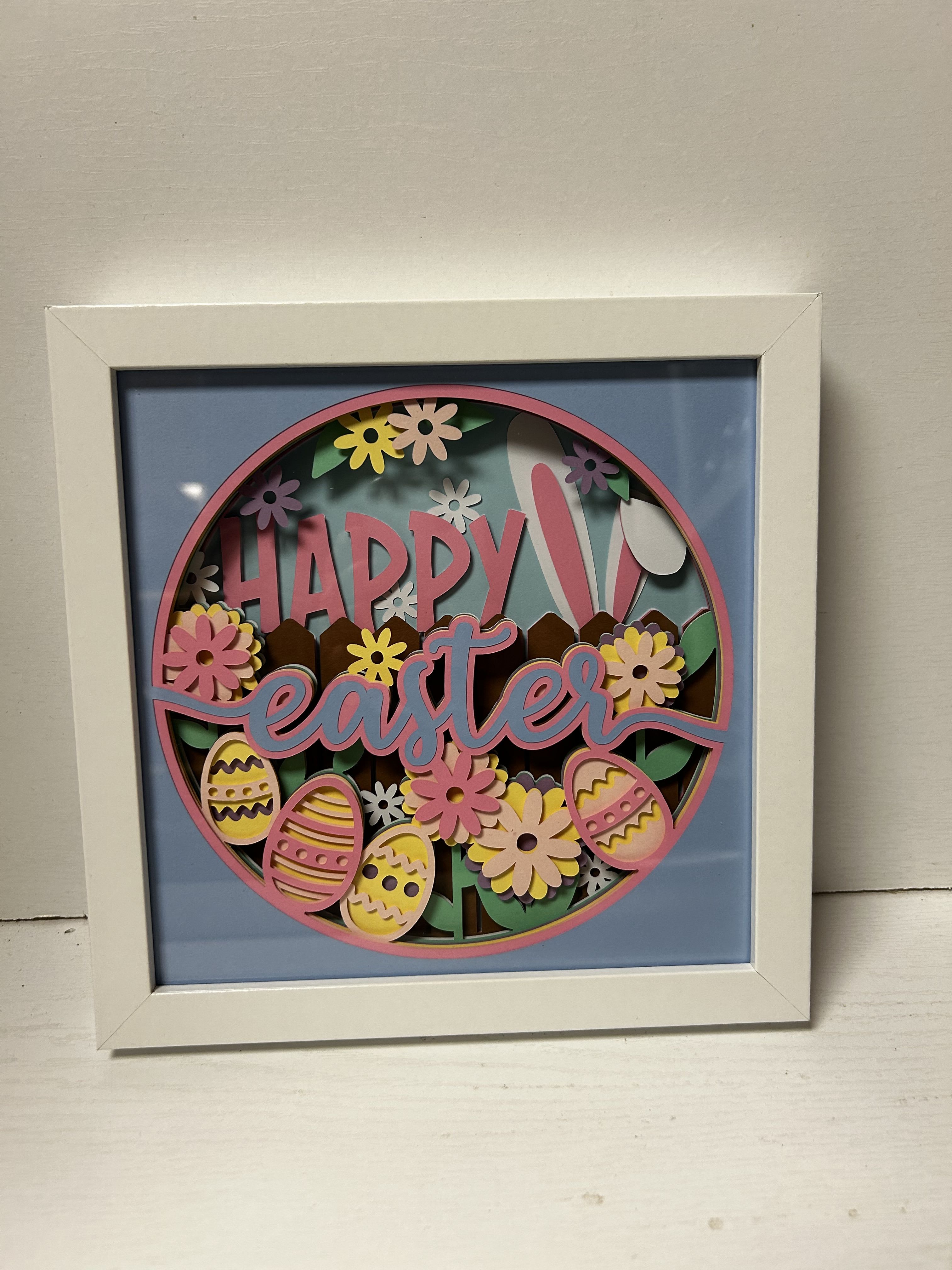 Framed Easter sign with flowers and decorated eggs