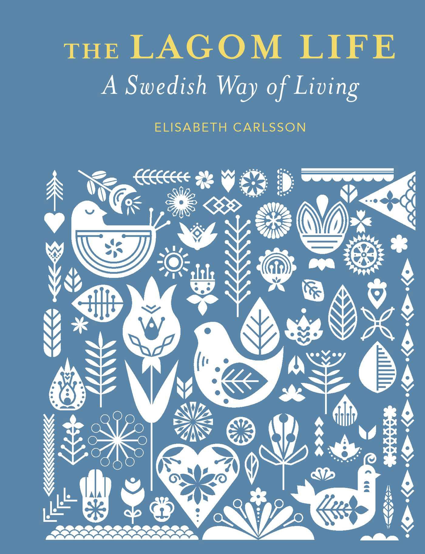 Blue book cover with white folk-art birds and floral motifs