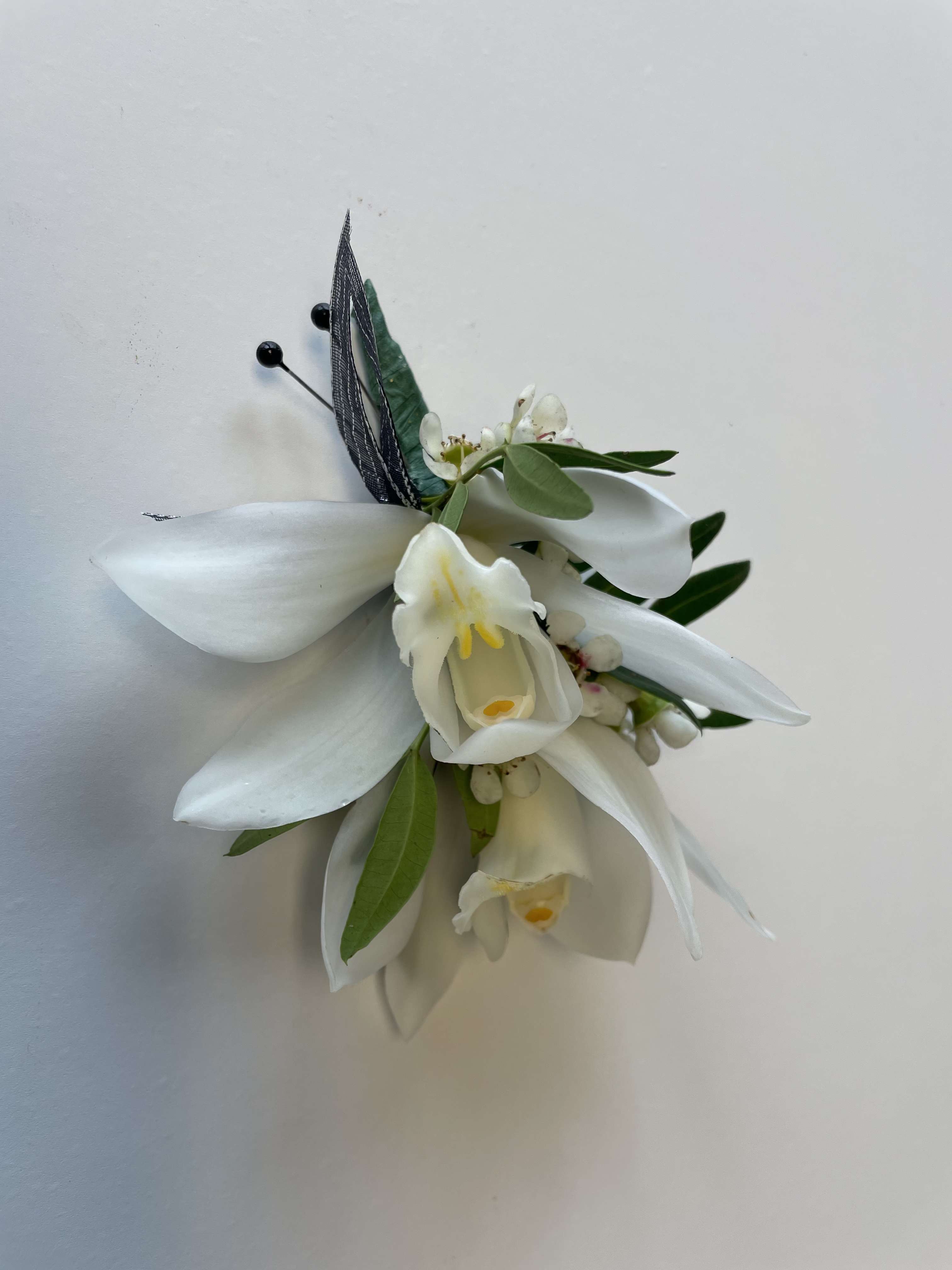 White Prom Boutonniere - A beautiful Mini Cymbidium Orchid Corsage for Prom or Homecoming boys.