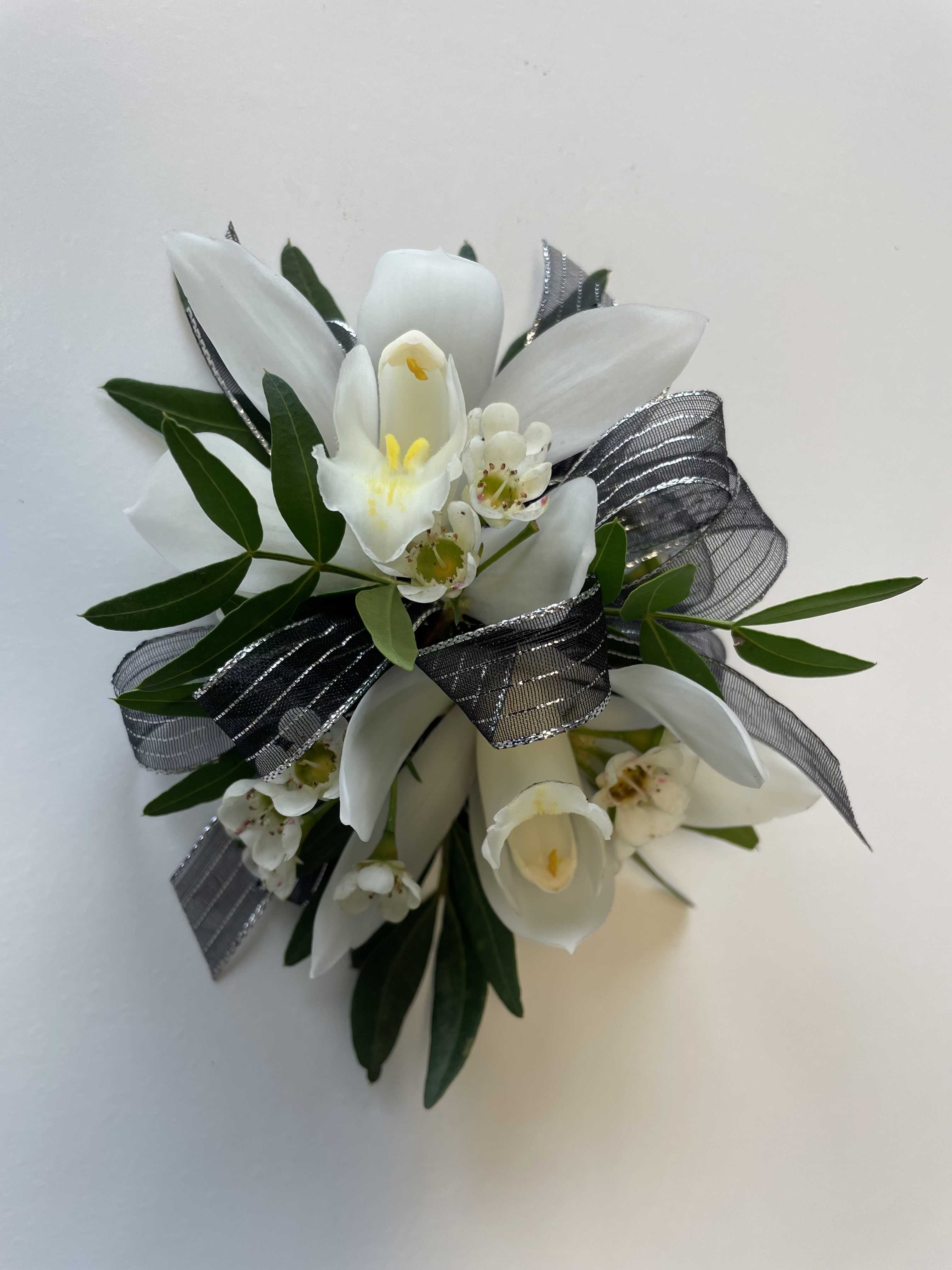 White Prom Corsage - A beautiful Mini Cymbidium Orchid Corsage for Prom or Homecoming girls. 