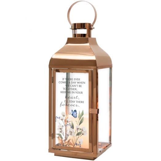 Copper lantern with a printed memorial message and floral design