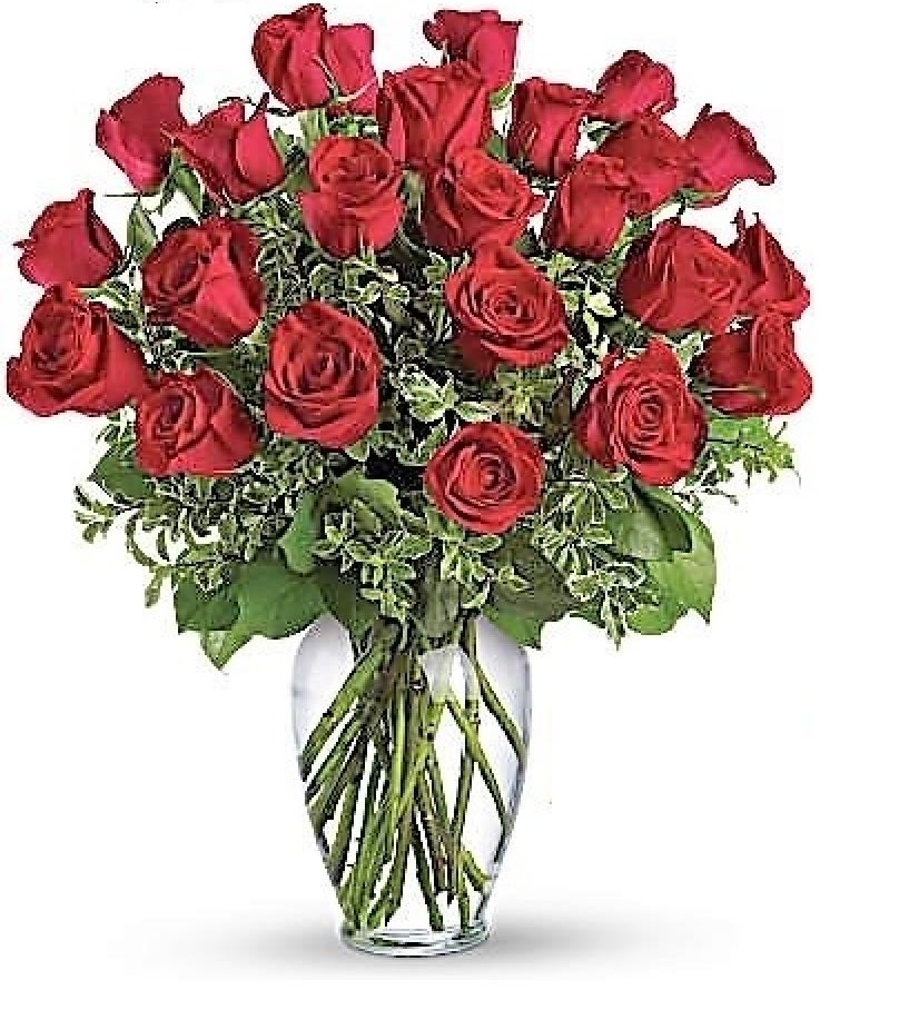 Arrangement of red roses in a clear glass vase