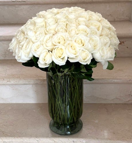 100 Roses White Premium arranged in a vase - 100 White Premium Roses arranged in a vase