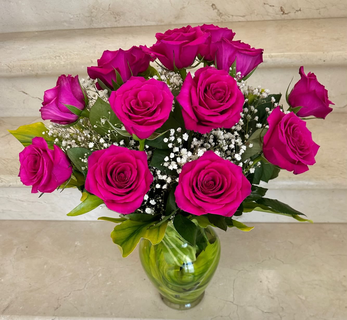 12 Roses Hot Pink arranged in a vase - 12 Hot Pink Roses arranged in a vase