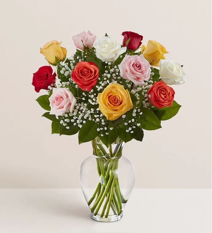 The Mix of Roses  - 12 roses Send an explosion of color with this long-stemmed rose arrangement perfect for celebrations or showing your appreciation. A great alternative to the classic red rose, send a giant arrangement of multicolored bright roses.  Approximate Dimensions: 20''D x 28""H
