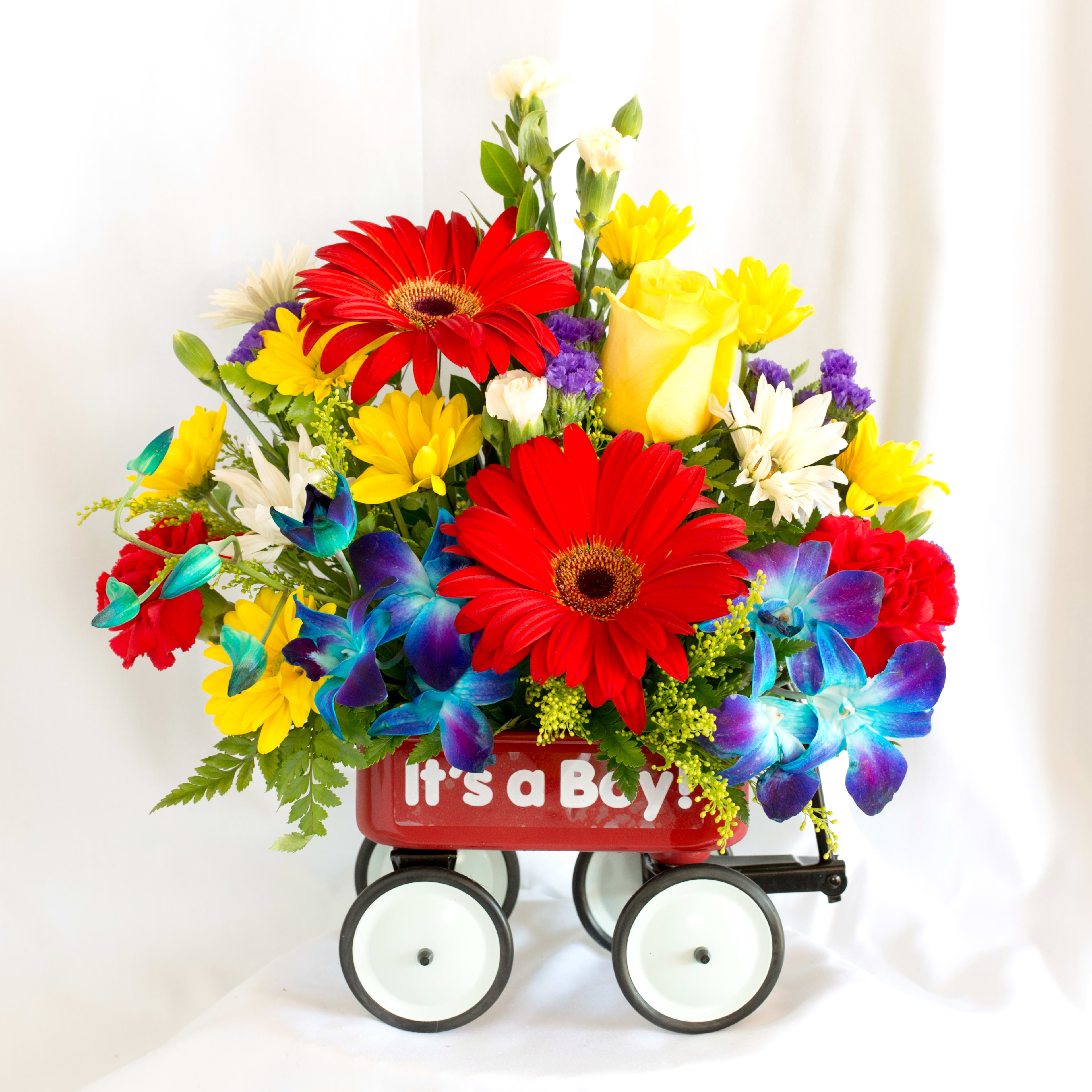 Colorful bouquet in a red wagon with "It's a Boy!" text