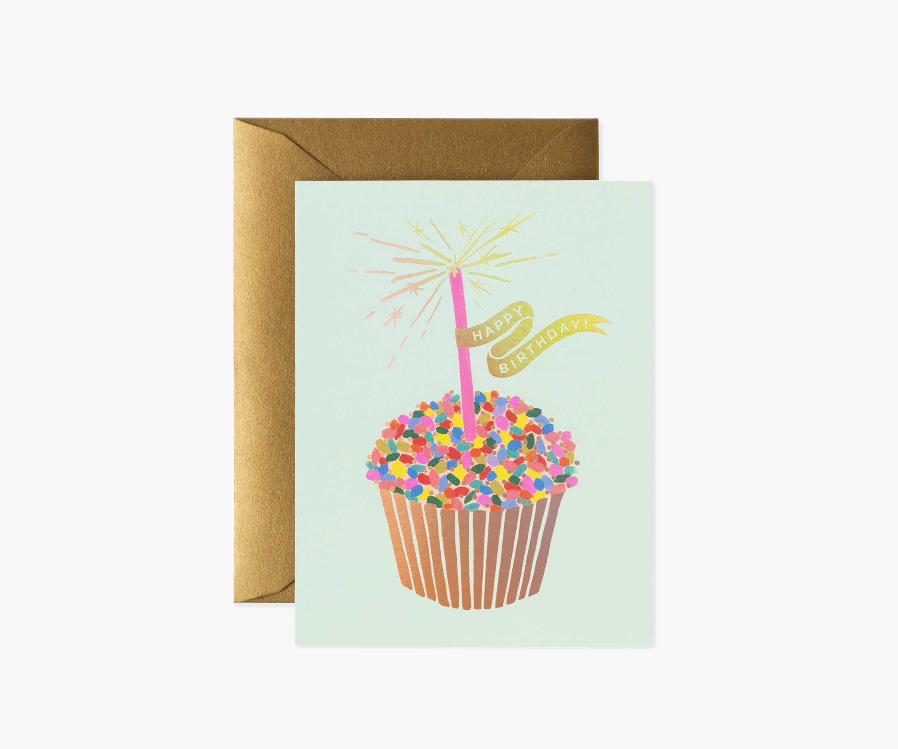 Birthday card with a cupcake and sparkler, shown with a gold envelope
