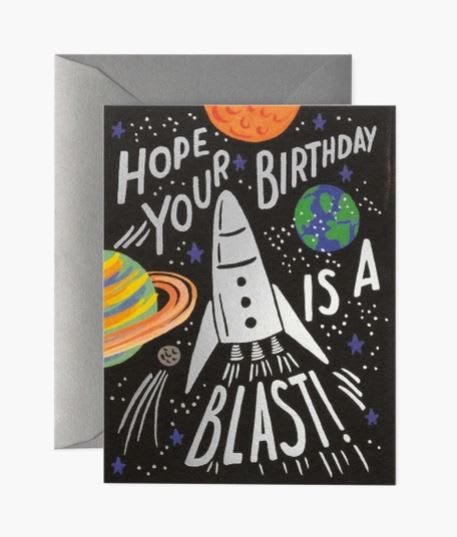 Birthday card with a rocket and planets in space