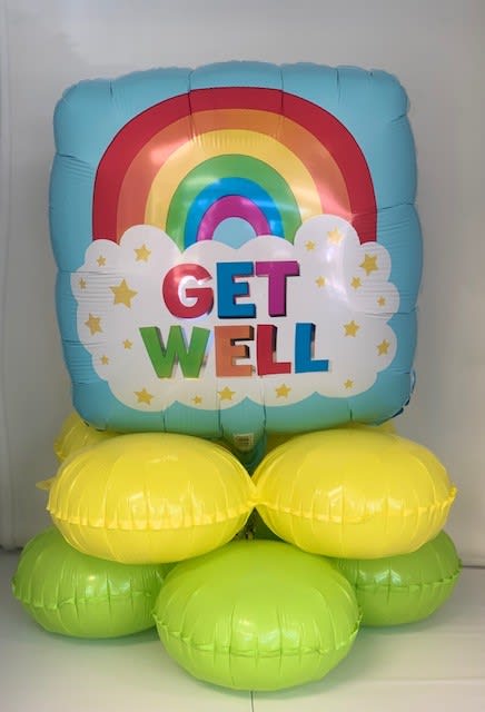 Rainbow "Get Well" balloon arrangement with yellow and green base balloons