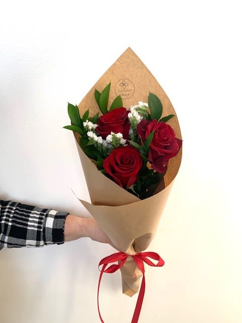 Three rose wrap - 3 roses beautifully arranged, wrapped and tied with a ribbon to add a touch of elegance. This gift is a timeless way to express love, affection or gratitude. If no color is specified in special instructions, an in stock color will be chosen.