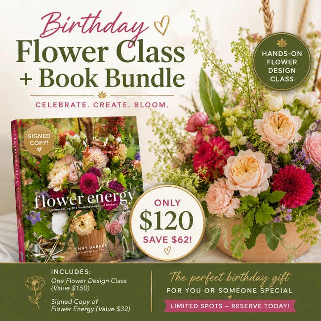 Flower arrangement beside a book and birthday class promo text