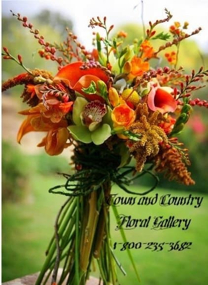 Orange and green bouquet with calla lilies and mixed blooms