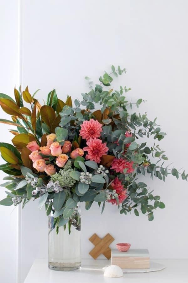 Pink and peach bouquet in a clear glass vase