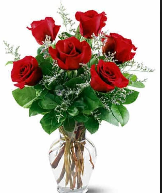 Bouquet of red roses in a clear glass vase