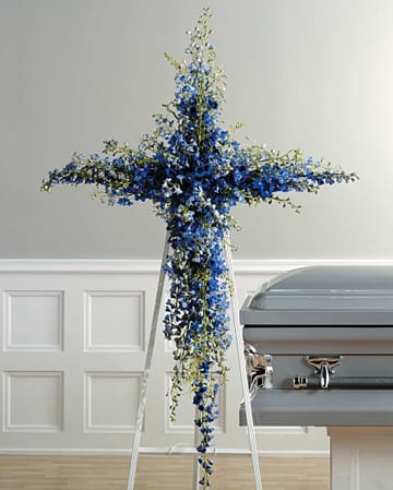 Blue Delphinium Cross - Sympathy spray with a visually moving arrangement of blue delphinium. [SF26-21]