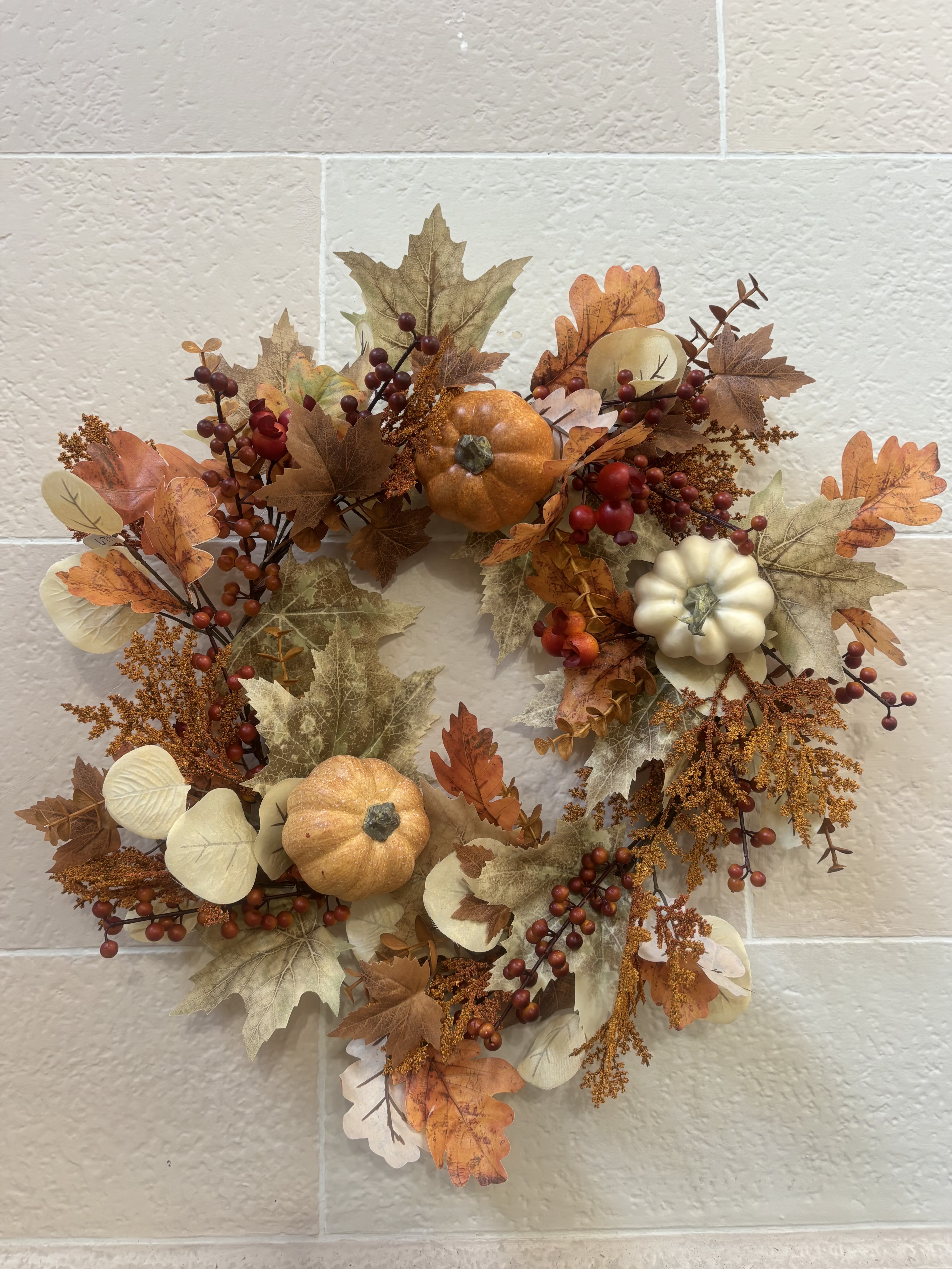 Pumpkin and Berries Wreath  - A fall wreath with pumpkins, leaves, and berries. 