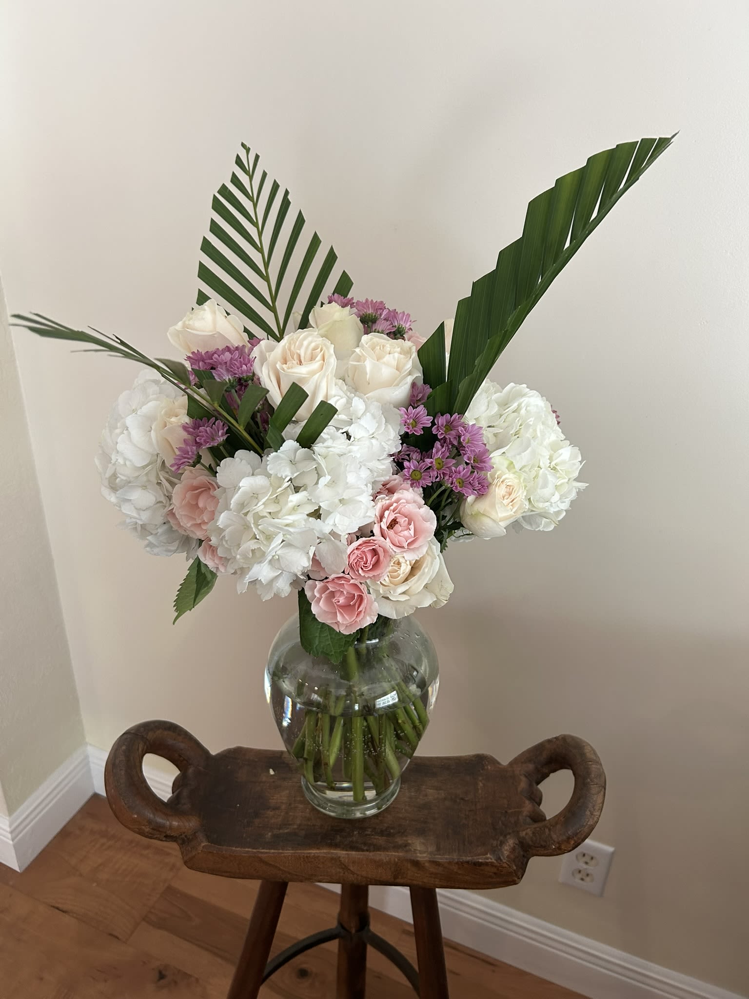 Pastel Peace - Pastel Roses and Spray roses with Hydrangeas, and accent piece, greenery palm can omitted by request.