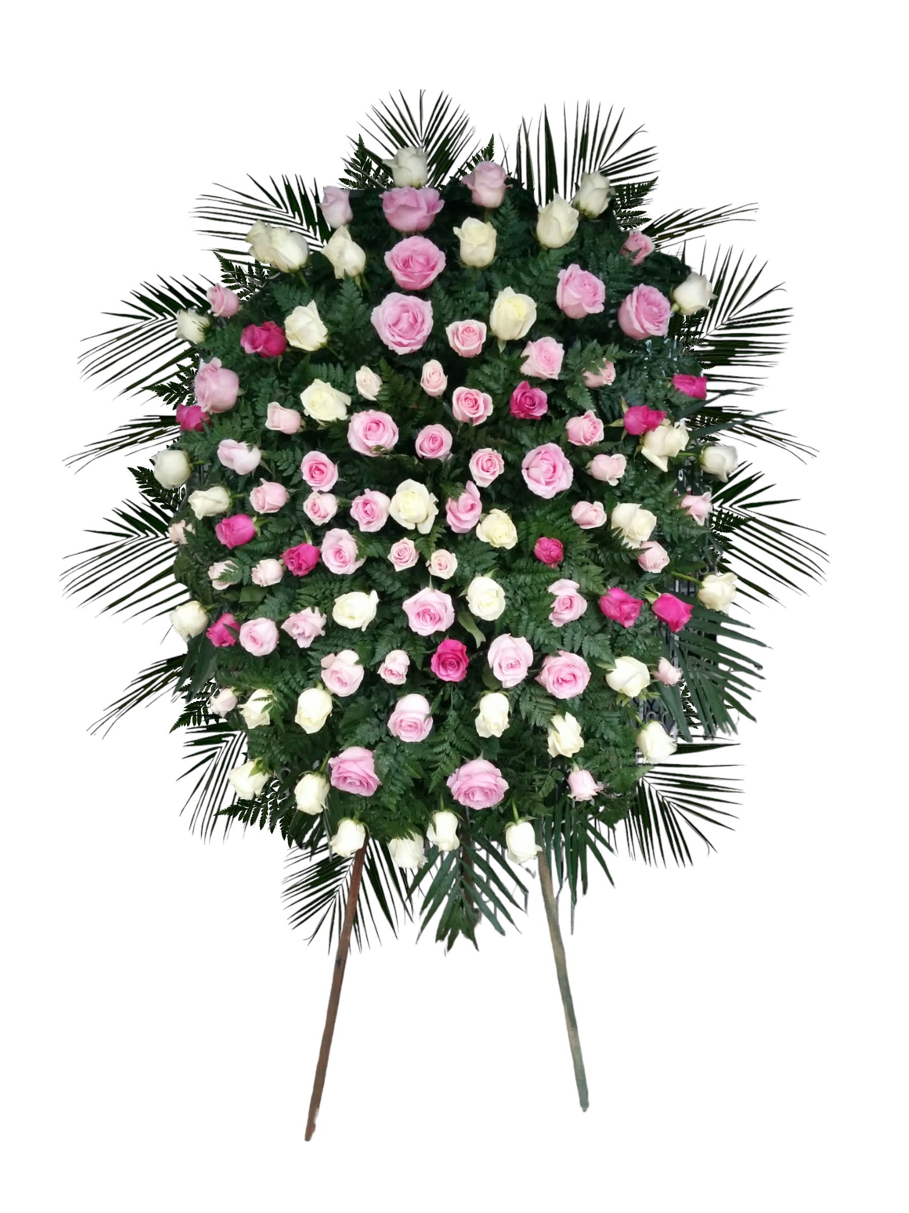 Standing floral spray of pink and white roses on a white background