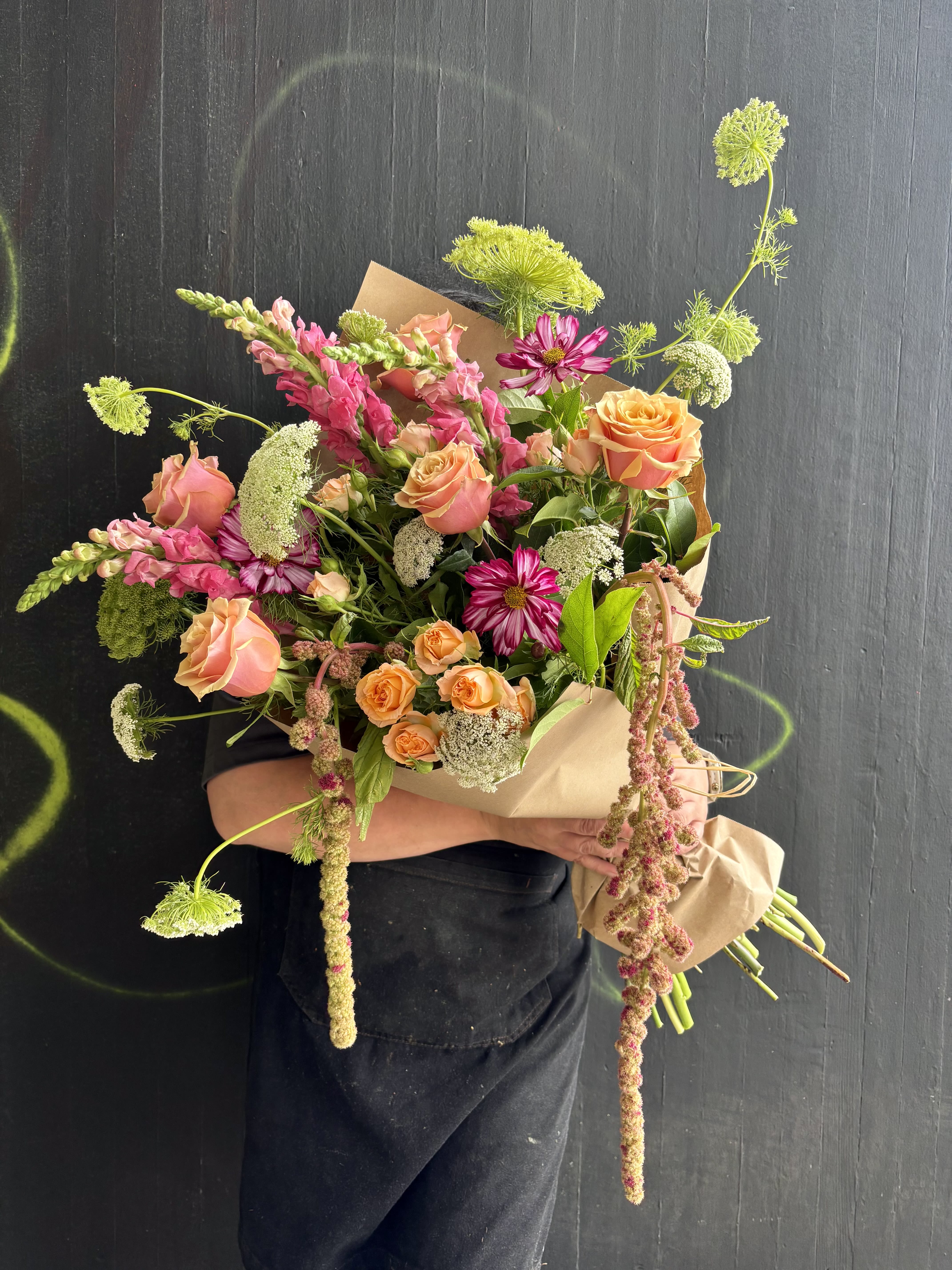 Seasonal Inspiration - This weekly seasonal arrangement showcases queen Anne's lace, roses, and cosmos.  Our "Designs of the Week" collection offers a seasonal selection of fresh flowers. These arrangements will be updated weekly,  with fresh and fun designs that will change with the season. Our goal is to  always offer a new look and feel in every design. Enjoy the early availability of the freshest seasonal flowers and foliage while they are in season! 