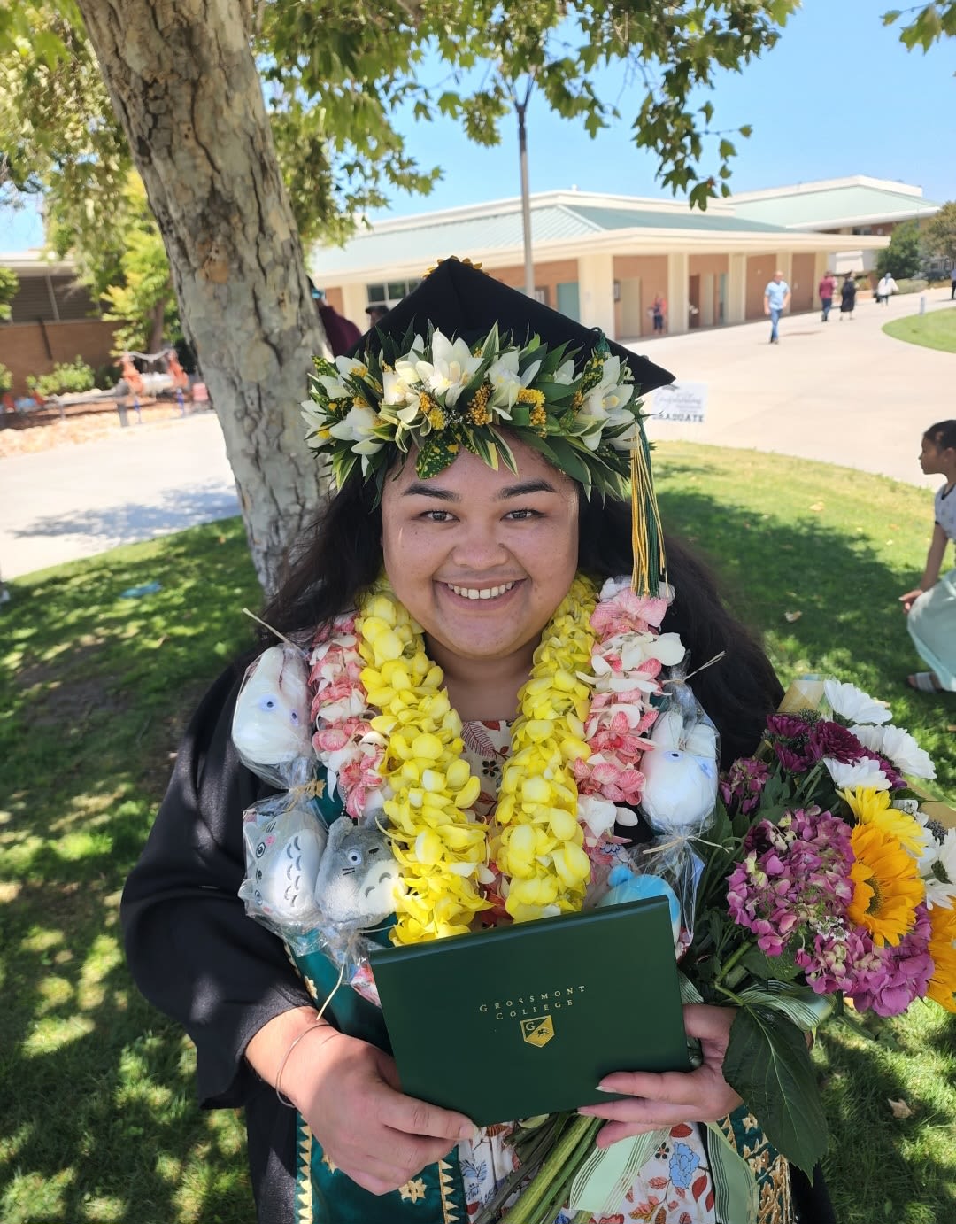 Double Orchid Lei - Yellow Graduation Lei - A bright cascade of double orchid leis makes a memorable graduation gift that instantly reads celebratory and proud-the perfect graduation flower.