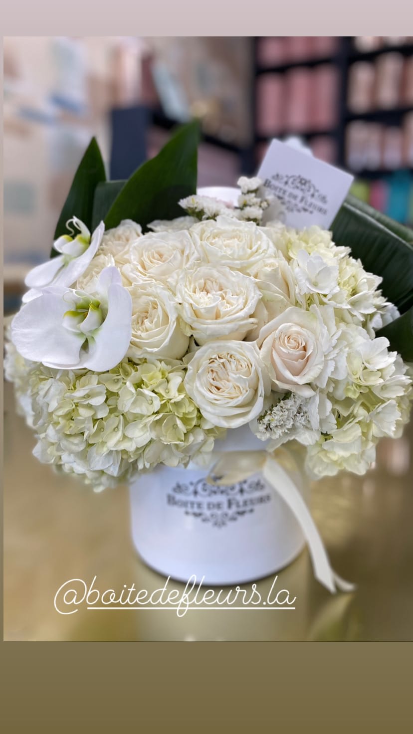 White rose bouquet with hydrangeas and calla lilies in a white box