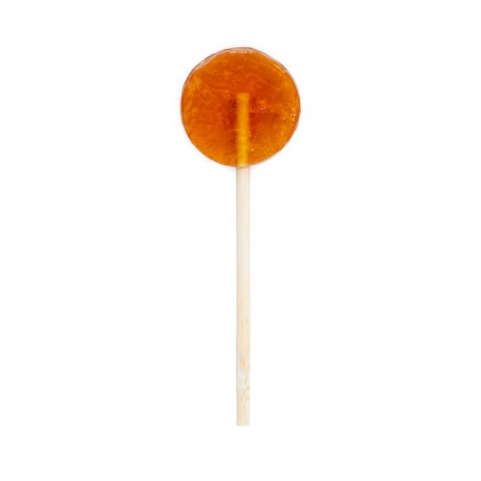 Orange round lollipop on a stick