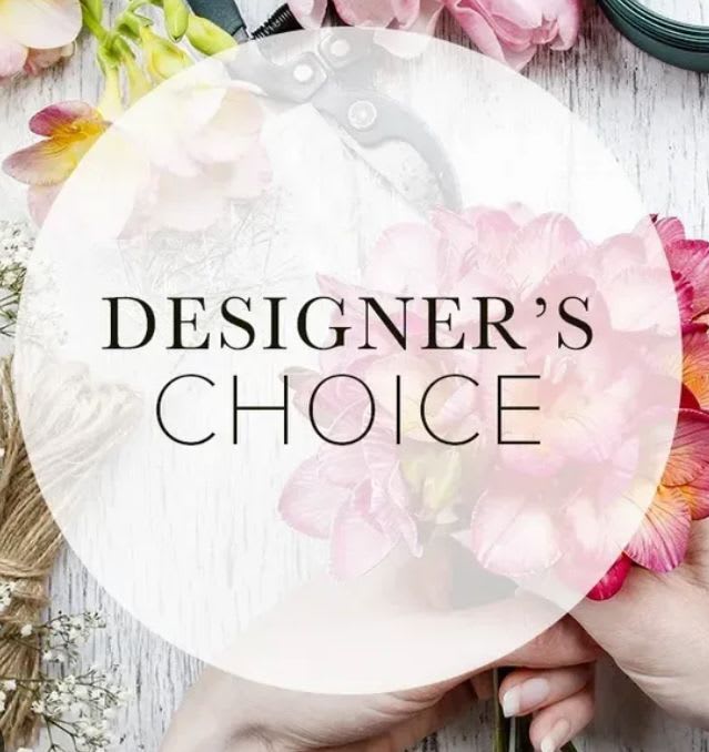 Round floral design with pink and white petals and the words "Designer’s Choice"