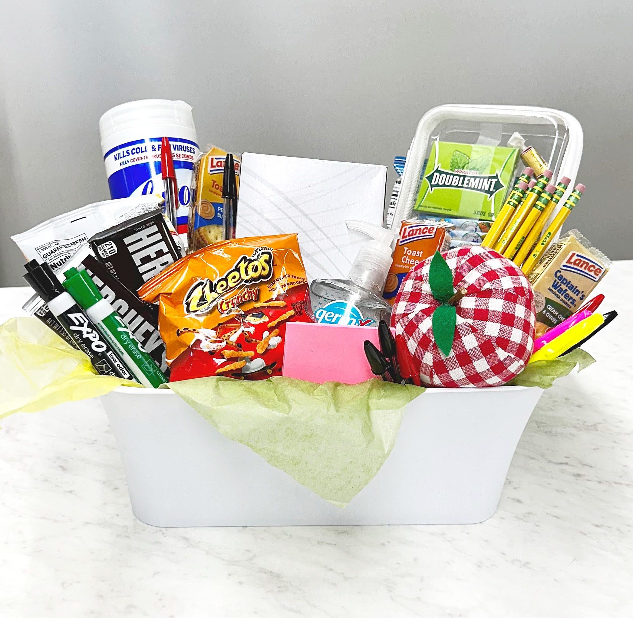 Teacher/Student stock up  - It's Back-To-School season! Send your favorite teacher a care-package stuffed with all of their most-needed back-to-school essentials! Each gift-basket comes with pens, markets, pencils, hand sanitizer, snacks, wipes, napkins, and a locally-sourced hand-made stuffed fabric apple! This is our September special "arrangement," so don't wait! This arrangement will be off the market at the end of the month!
